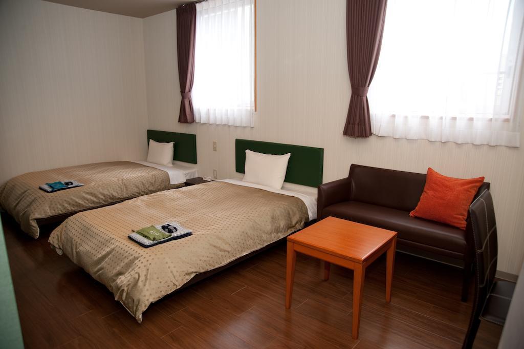 Hakata Sunlight Hotel Hinoohgi Фукуока Номер фото